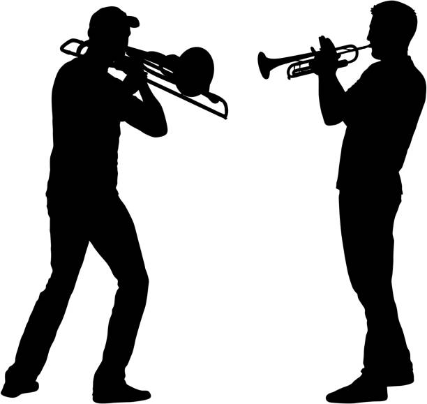 istock Silhouette of musician playing the trombone and trumpet on a white background 1092284396