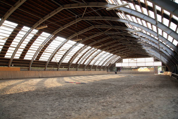 istock Empty riding hall  building interior without people ready for equestrian training wintertime 1092290564