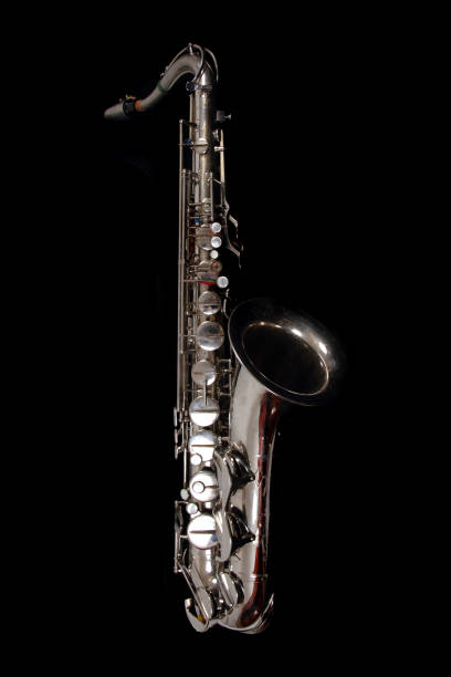 istock silver saxopphone isolated on the black background 1092291144