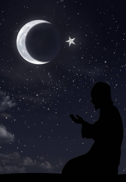 istock Muslim at night and hilal symbol 1092293202