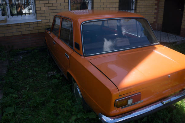 istock Vintage orange parked on a street 1092295414