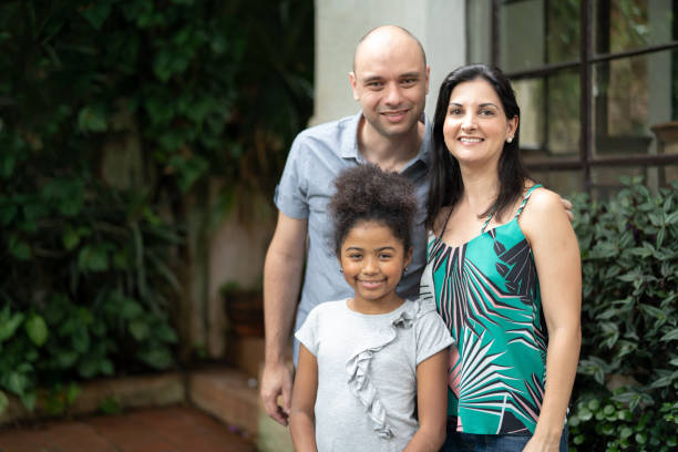 istock This child has a new family - Adopted child 1092296502