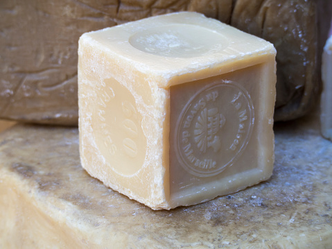 Aix-en-Provence/France - August 16 2016: Traditional Marseille soap in a souvenir shop. Marseille soap or Savon de Marseille is a traditional hard soap made from vegetable oils.