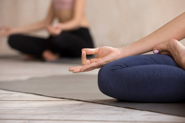 istock Close up female fingers folded in Jnana Mudra 1092303548