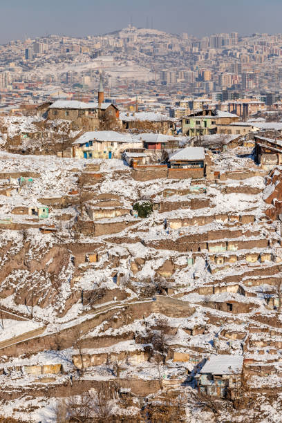 istock Suburb and Skyscrapers at winter with snow 1092304630