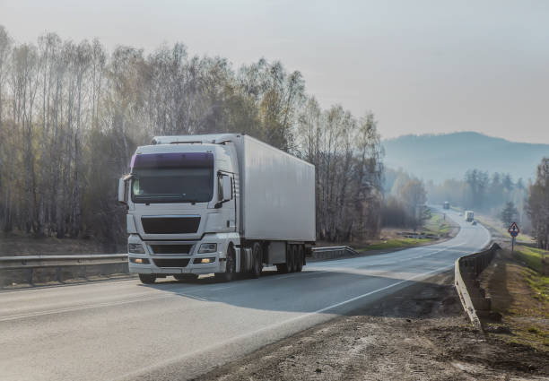 istock truck moves on highway 1092306250