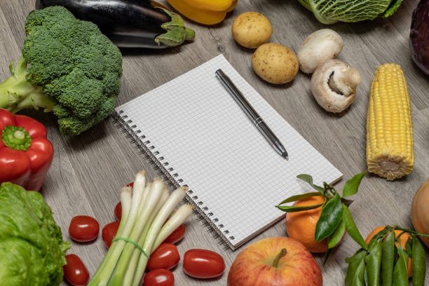 istock Healthy eating with vegetables and a notepad 1092308502