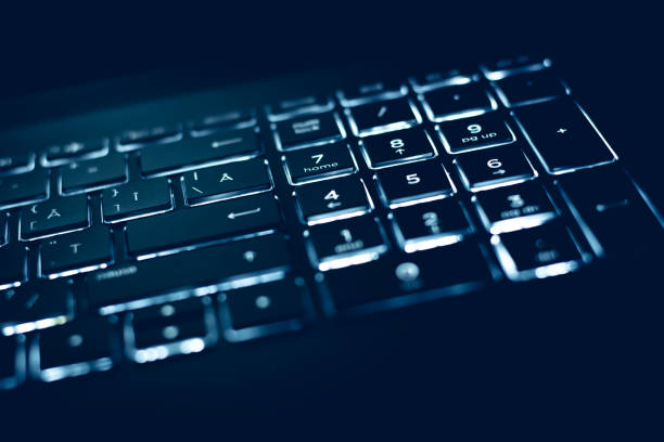 istock Closeup of laptop keyboard illumination, backlit keyboard 1092311698