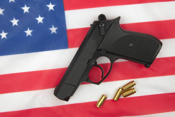 istock Pistol on american Flag 1092317964