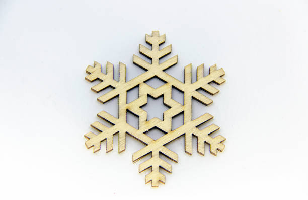 istock Wooden Snowflake Isolated Over the White Background. 1092320658