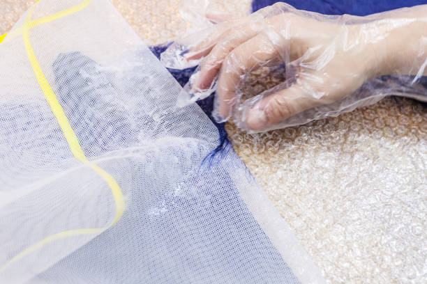 istock craftsman removes a mesh from presses fibers 1092320940