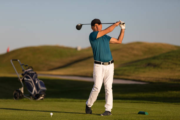 istock Golf player looking after shoting ball -  Links Golf 1092322968