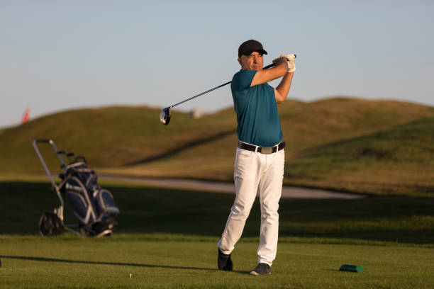 istock Golf player looking after shoting ball -  Links Golf 1092323724
