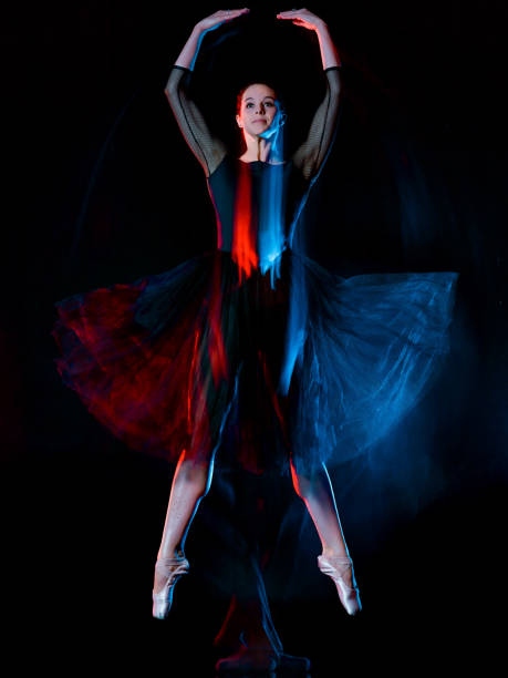 istock ballerina classical ballet dancer dancing woman isolated black b 1092323962