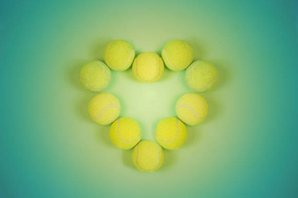 istock Tennis Balls in Heart Shape Love 1092330572