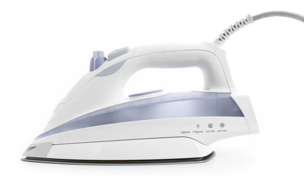 istock Steam iron laid on white background, elegant gray model 1092336212