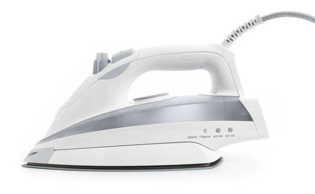 istock Steam iron laid on white background, elegant gray model 1092336502