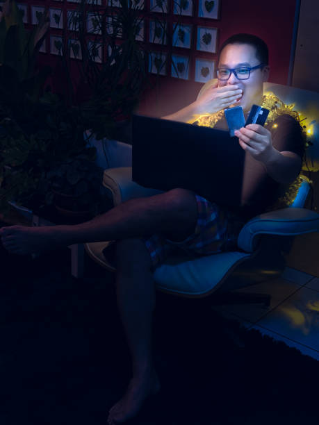 istock Asian man shopping online at Christmas. 1092342160