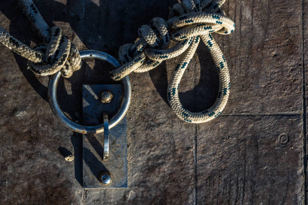 istock Rusty Chain and Rope near Dock 1092346470