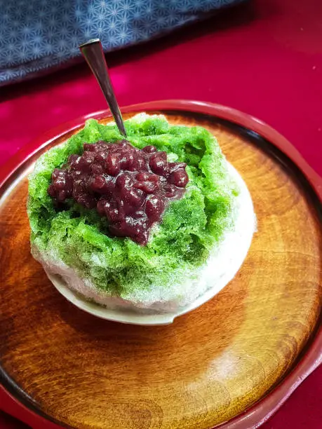 Shaved ice, matcha green tea and red beans.