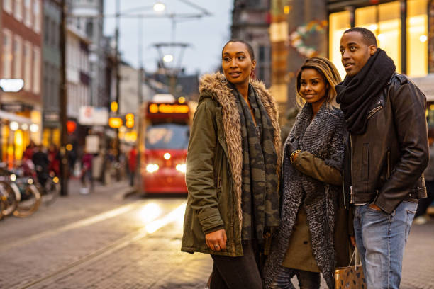 istock Three Beautiful Black friends at Christmas Shopping 1092352532