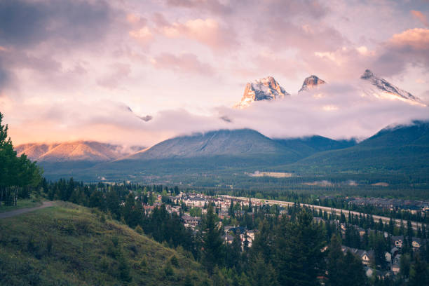 The Three Sisters in Banff National Park. \nCanmore, Alberta, Canada.