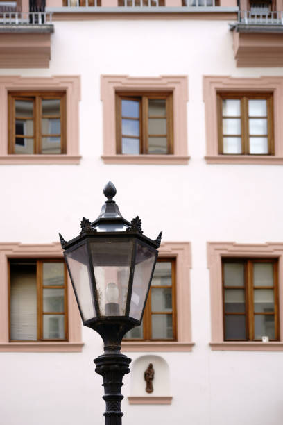 istock Nostalgic street lamp in front of old house 1092370008
