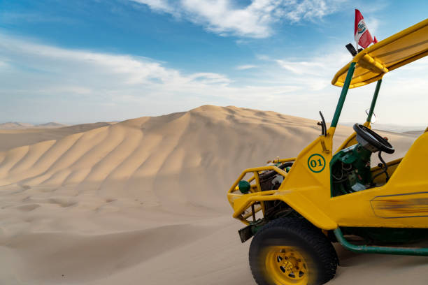 istock Beach buggy on beside Oasis in Huacachina, Peru 1092370678