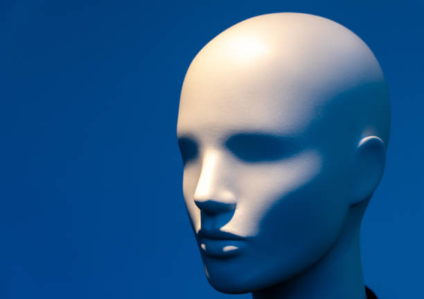 istock Close-Up Of Mannequin Against Blue Background 1092380132