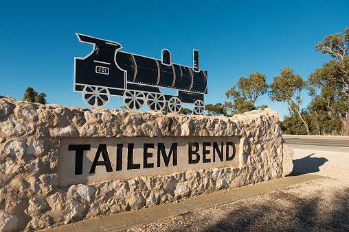 Tailem Bend town entering sign at Princes Highway in South Australia. Old historic town, road trip tourist destination.