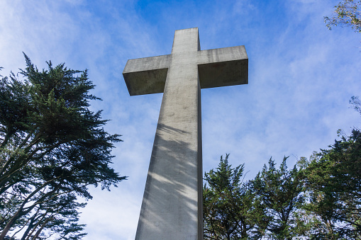 Christian Cross against a cloudy sky