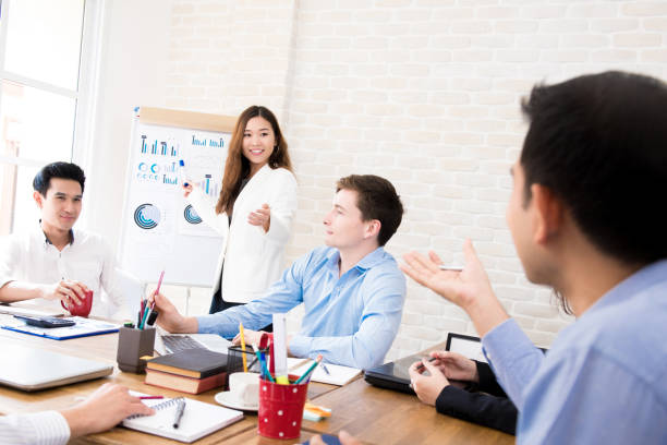 istock Young Asian businesswoman presenting her work 1092392872