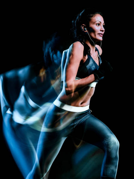 istock beautiful woman runner jogger jogging running isolated black bac 1092401244