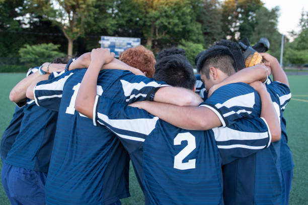 istock Soccer team huddling before a game 1092406934