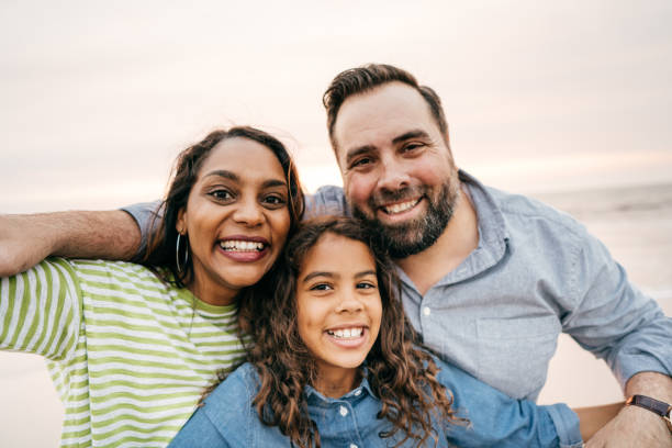 istock Family with one daughter looking to the camera 1092407638