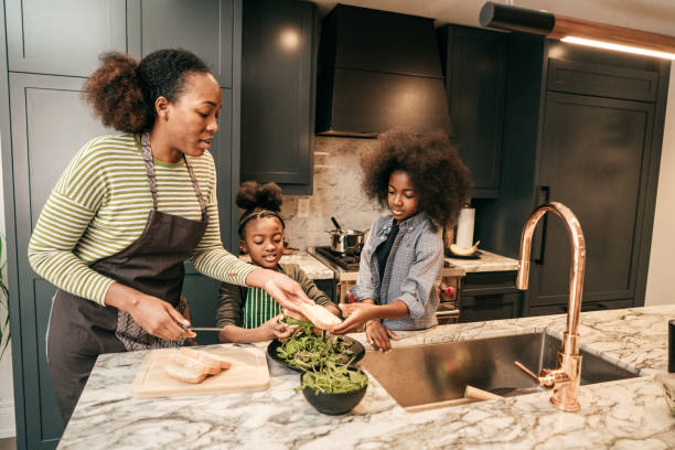 istock Mom and siblings in the kitchen 1092407644