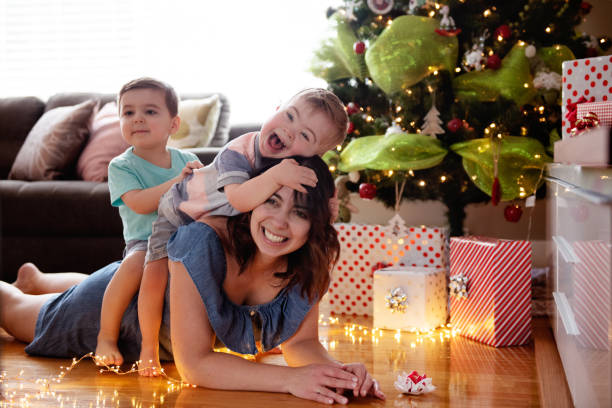 Christmas summer with single mother and her sons stock photo