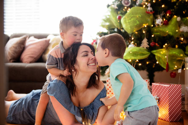 istock Christmas summer with single mother and her sons 1092410362