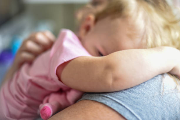 istock Mother comforting sick child 1092430088