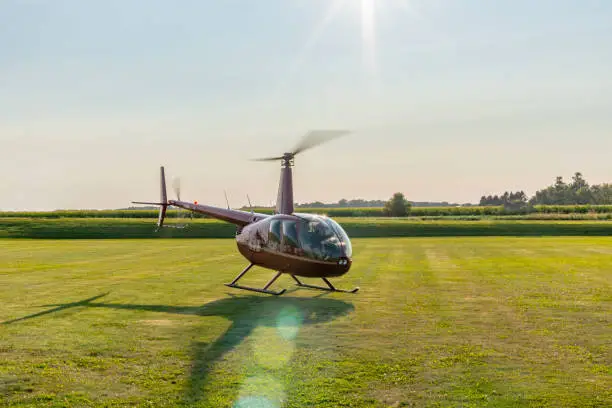 helicopter sightseeing ride taking off from field