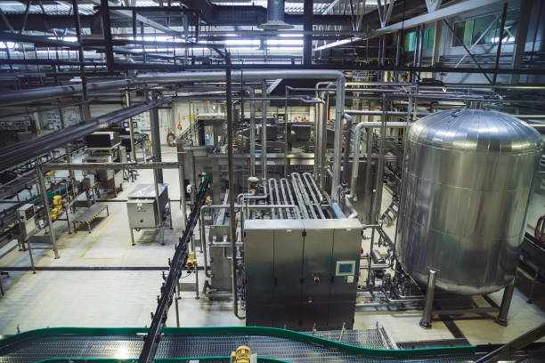 istock Modern brewery production line. Large vat for beer  fermentation and maturation, pipelines and filtration system 1092438678