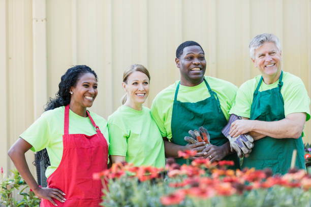 istock Multi-ethnic group of workers at plant nursery 1092440648