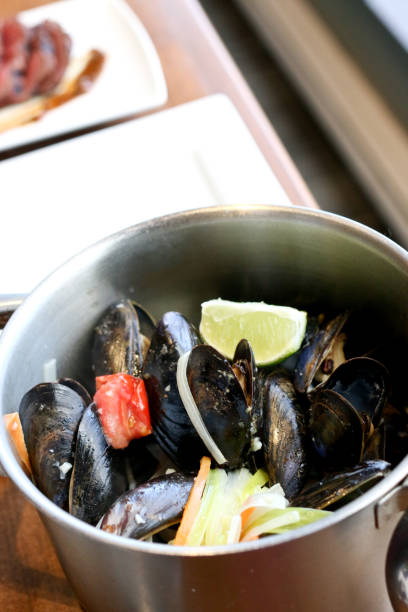 istock steamed mussels in a steel pot 1092443620
