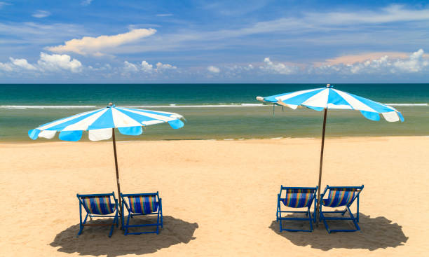 istock Beach Chairs With Umbrellas On The White Sand Beach. 1092445174