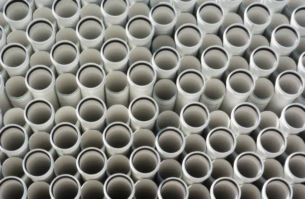 white plastic PVC pipes stacked