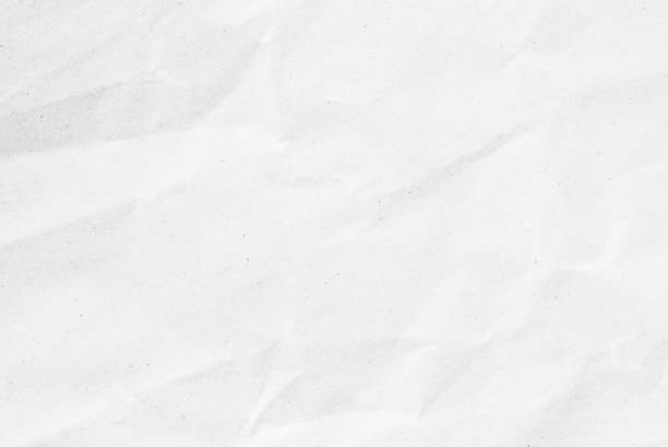 natural reciclado papel o papeles closeup de arrugas textura brillante hoja de trabajo. se adornan de arte luz tono blanca. - manuscript ancient book aging process fotografías e imágenes de stock