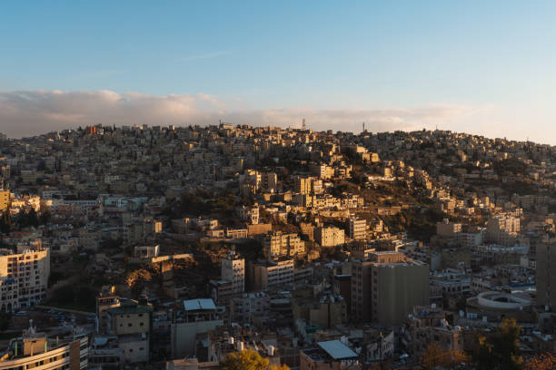 Amman cityscape, capital city in Jordan, Middle East in sunset stock photo