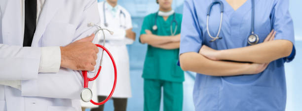 istock Doctor working in hospital with other doctors. 1092469594