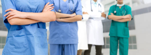 istock Doctor working in hospital with other doctors. 1092469632