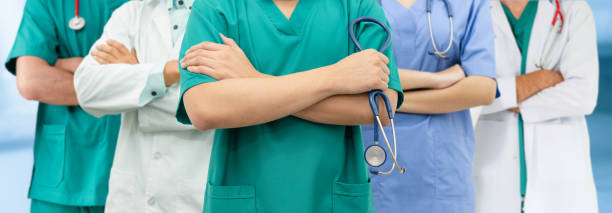 istock Doctor working in hospital with other doctors. 1092469634